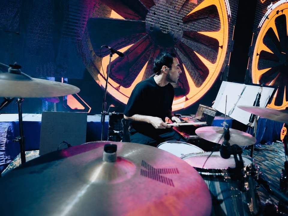 YAM drummer performing during a live music session